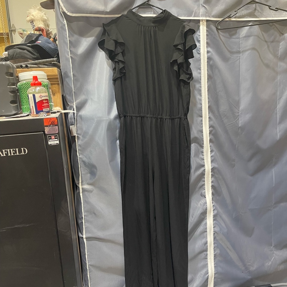 1. State Black Jumpsuit with Ruffle Detail